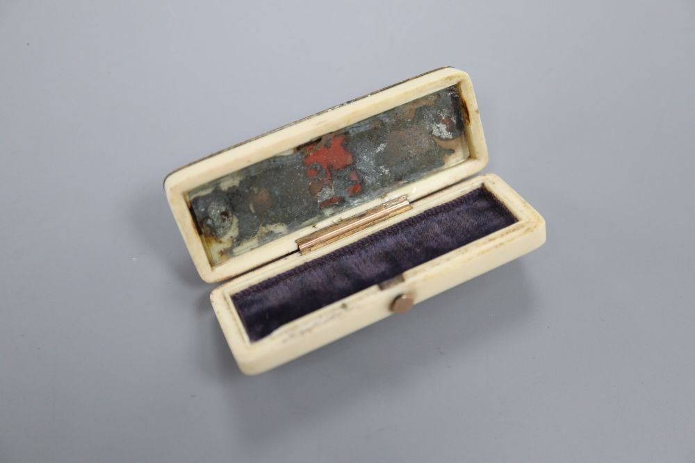 A rectangular ivory and yellow metal toothpick case